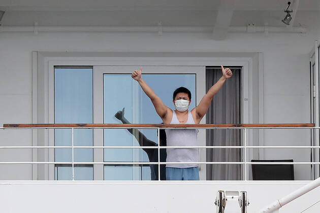 ARTANIA CRUISE SHIP DEPARTURE, A crew member on the cruise ship MV Artania is seen waving goodbye as it departs Fremantle harbour on Saturday, April 18, 2020. The MV Artania arrived in Fremantle over three weeks ago and a reported 79 crew and passengers have tested positive for coronavirus. Two crew members and one passenger have died from the virus.( NO ARCHIVING, EDITORIAL USE ONLY, NO USE IN BOOKS WITHOUT CONSENT PERTH WA AUSTRALIA Copyright: xRICHARDxWAINWRIGHTx 20200418001464081116
