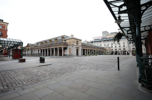 Day Twenty Six of Lockdown in London. Midday and Covent Garden Market is deserted on a very quiet central London for a Saturday as the country is on lockdown due to the COVID-19 Coronavirus pandemic. People are not allowed to leave home except for minimal food shopping, medical treatment, exercise - once a day, and essential work. COVID-19 Coronavirus lockdown, London, UK, on April 18, 2020 