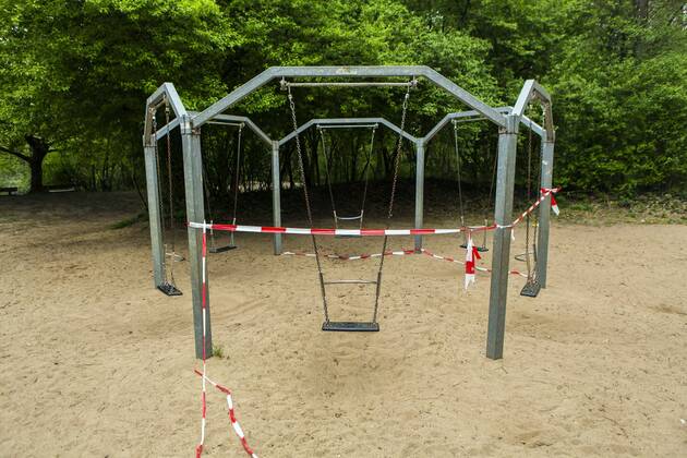 A playground in Cologne Dellbrück NRW Blocked playground due to contact ban because of the corona virus with flutterband