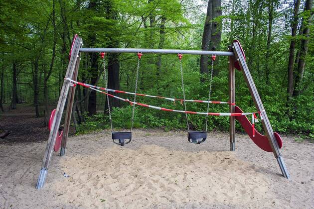 A playground in Cologne Dellbrück NRW Blocked playground due to contact ban because of the corona virus with flutterband