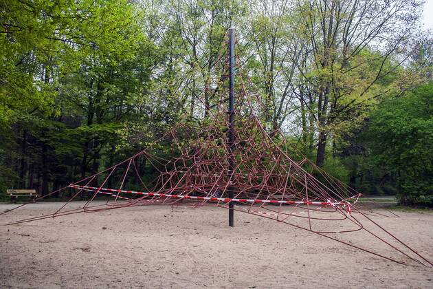 A playground in Cologne Dellbrück NRW Blocked playground due to contact ban because of the corona virus with flutterband