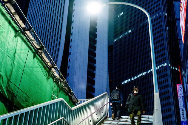 April 19, 2020, Tokyo, Japan: A man wearing a face mask for protection walks in Shinjuku area that s almost deserted during the covid-19 crisis..The Japan government declared a state of emergency to cover the whole country and will continue until May 6. Tokyo governor, Yuriko Koike has asked restaurants and bars to be closed at 8pm as a preventive measure against COVID-2019. Tokyo Japan - ZUMAs197 20200419_zaa_s197_085 Copyright: xViolaxKamx