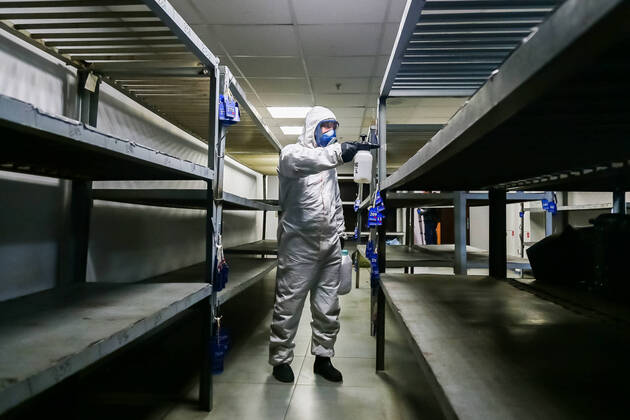 MOSCOW, RUSSIA - APRIL 20, 2020: An employee of the Russian Emergencies Ministry disinfecting the Paveletsky railway station amid the ongoing COVID-19 coronavirus pandemic. Russian Emergencies Ministry TASS  TS0D675D