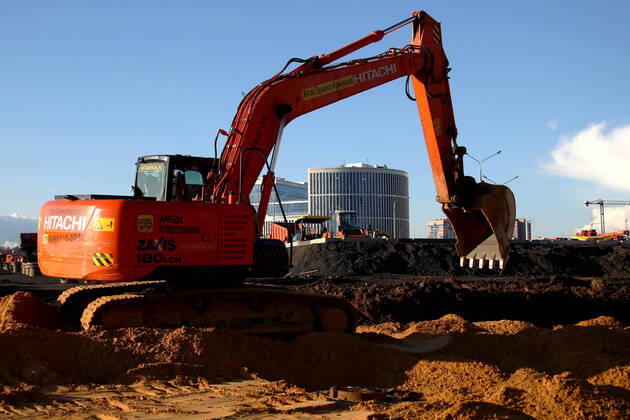 MOSCOW, RUSSIA - APRIL 20, 2020: An excavator at the construction site of a new building of the Novomoskovsky multipurpose medical center for patients with suspected COVID-19 coronavirus infection. Valery Sharifulin TASS  TS0D6769