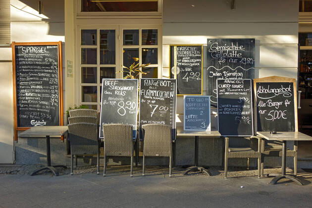 20 04 2020,Berlin,Germany,GER,the city at the time of the Corona pandemic Price boards of a restaurant in the Pariser Strasse Ausser Haus Verkauf