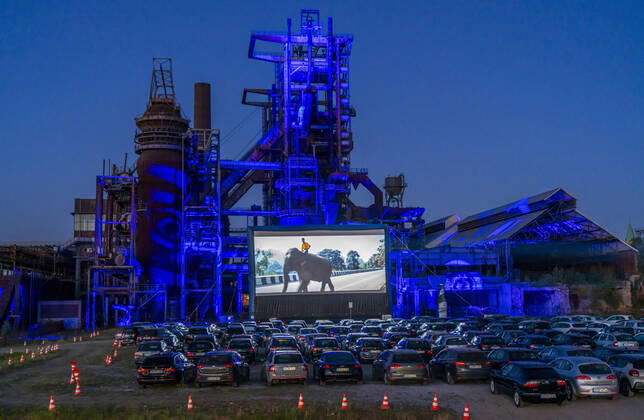 Drive-in cinema Dortmund, against the backdrop of the former blast furnace plant Phoenix West in Dortmund Hörde, temporary film screening, event in compliance with contact restrictions, effects of the corona crisis in Germany