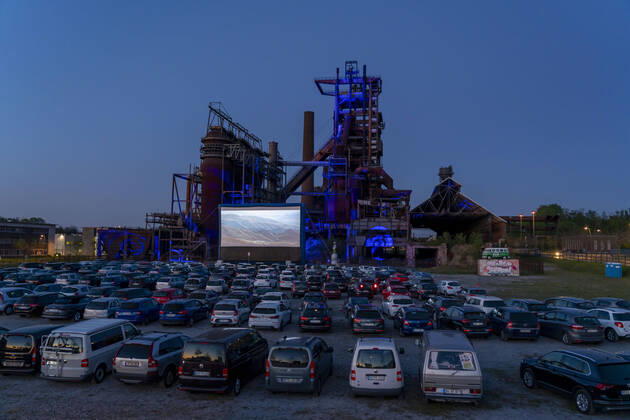 Drive-in cinema Dortmund, against the backdrop of the former blast furnace plant Phoenix West in Dortmund Hörde, temporary film screening, event in compliance with contact restrictions, effects of the corona crisis in Germany
