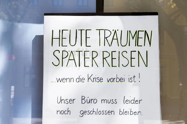 SHOWWINDOW SHEET CORONA IN WEIMAR 21 04 2020 Weimar A sign with the inscription ãToday dreams later journeys É when the crisis is over Ò in a shop window in Weimar on 21 April 2020