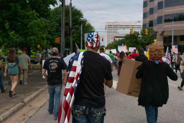 April 21, 2020, Raleigh, NC, USA: ReOpenNC protesters calling for ending or relaxing coronavirus executive orders in Raleigh, NC Tuesday, April 21, 2020. Raleigh USA - ZUMAd43_ 20200421_znp_d43_008 Copyright: xMehmetxDemircix