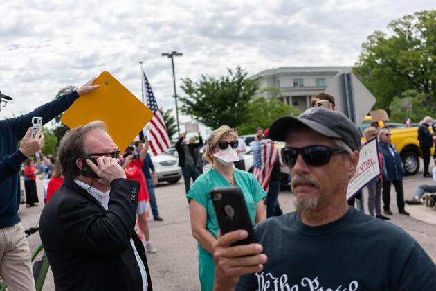 April 21, 2020, Raleigh, NC, USA: ReOpenNC protesters calling for ending or relaxing coronavirus executive orders in Raleigh, NC Tuesday, April 21, 2020. Raleigh USA - ZUMAd43_ 20200421_znp_d43_012 Copyright: xMehmetxDemircix