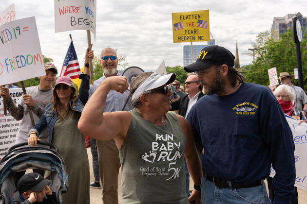 April 21, 2020, Raleigh, NC, USA: ReOpenNC protesters calling for ending or relaxing coronavirus executive orders in Raleigh, NC Tuesday, April 21, 2020. Raleigh USA - ZUMAd43_ 20200421_znp_d43_015 Copyright: xMehmetxDemircix