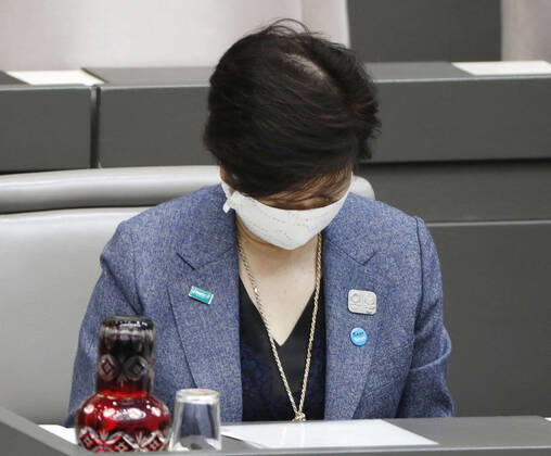 New coronavirus Tokyo Gov. Yuriko Koike bows after the metropolitan assembly passes a supplementary budget for fiscal 2020, centering on measures against the coronavirus outbreak, on April 22, 2020. 