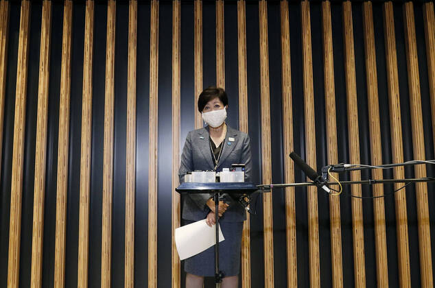 New coronavirus Tokyo Gov. Yuriko Koike speaks to reporters in Tokyo on April 22, 2020, after holding talks with economic revitalization minister Yasutoshi Nishimura over the coronavirus pandemic. 