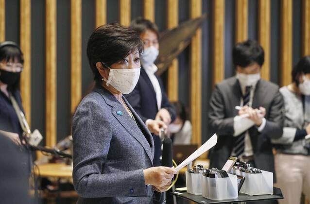 New coronavirus Tokyo Gov. Yuriko Koike speaks to reporters in Tokyo on April 22, 2020, after holding talks with economic revitalization minister Yasutoshi Nishimura over the coronavirus pandemic. 