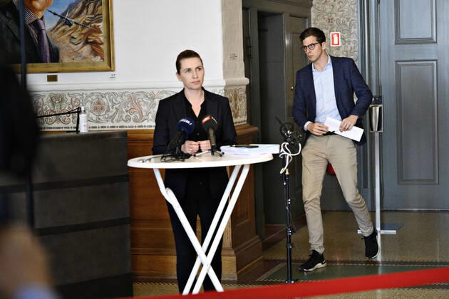 Alex Vanopslagh LA passes Prime Minister Mette Frederiksen S, who speaks to the press following a party leadership reopening in Christiansborg, Thursday, April 23, 2020 Party leaders meet on test strategy and further process ahead of phase two of the reopening of Denmark following covid 19 closures, Copenhagen Denmark,  Copyright: PhilipxDavali PhilipxDavalix cop105 spdk20200423-152918-L