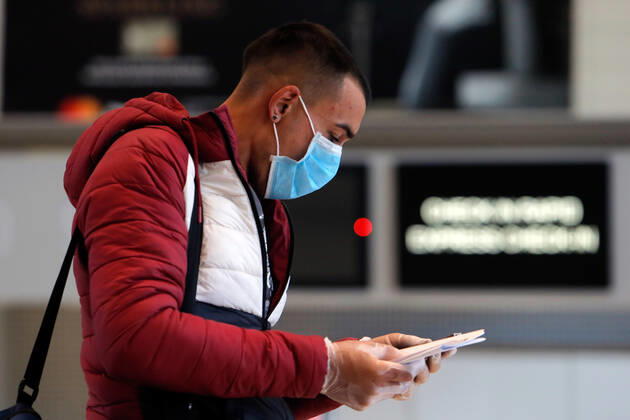 (200423) -- BUCHAREST, April 23, 2020 (Xinhua) -- A seasonal worker from Romania to the United Kingdom for agricultural harvest prepares to check in for his departure flight amid COVID-19 pandemic at the Henri Coanda International Airport near Bucharest, Romania, on April 23, 2020. Romania has reported 386 new COVID-19 cases in the past 24 hours, bringing the total number of confirmed cases to 10,096, local authorities said on Thursday. (Photo by Cristian Cristel Xinhua) ROMANIA-BUCHAREST-COVID-19-SEASONAL WORKERS 