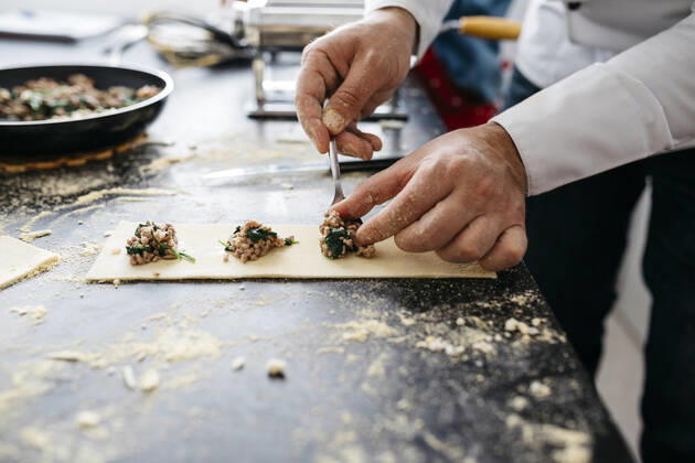 Close-up of man preparing homemade gluten free pasta model released Symbolfoto property released JRFF04308