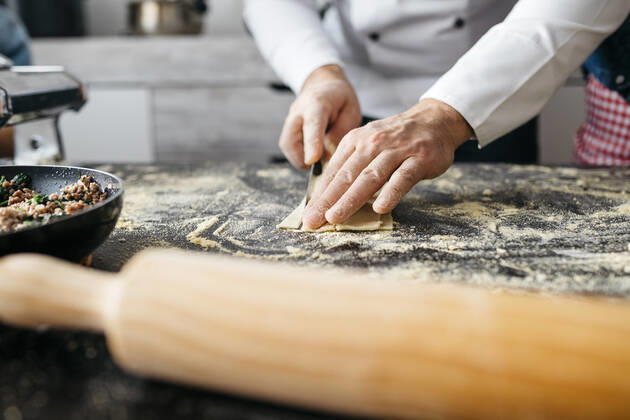 Close-up of man preparing homemade gluten free pasta model released Symbolfoto property released JRFF04309