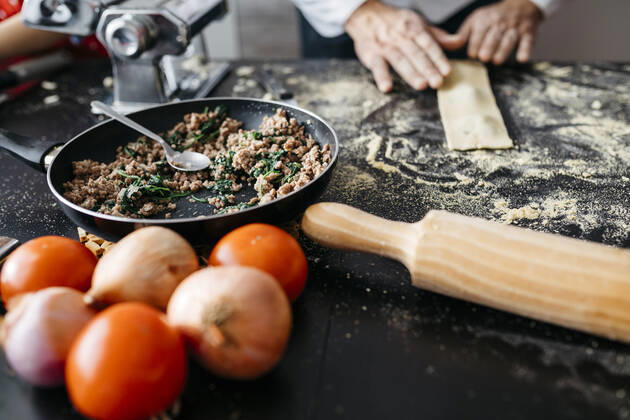 Close-up of man preparing homemade gluten free pasta model released Symbolfoto property released JRFF04310