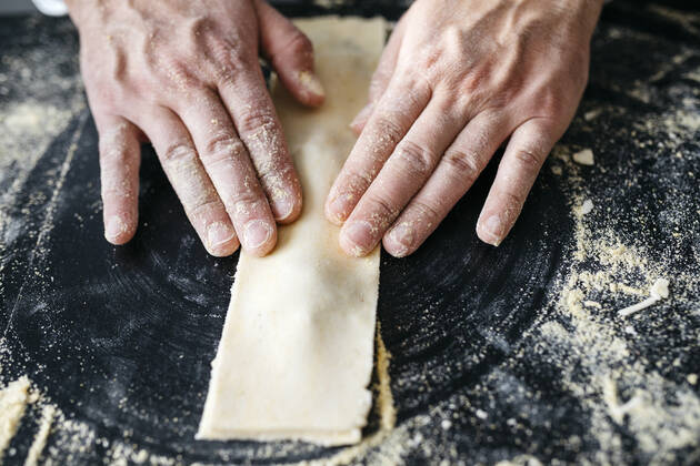 Close-up of man preparing homemade gluten free pasta model released Symbolfoto property released JRFF04312