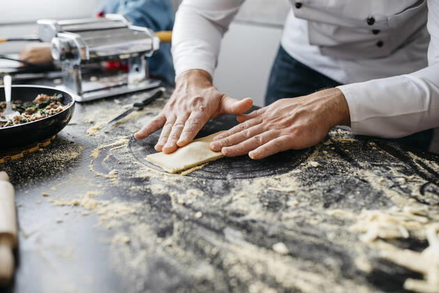 Close-up of man preparing homemade gluten free pasta model released Symbolfoto property released JRFF04313