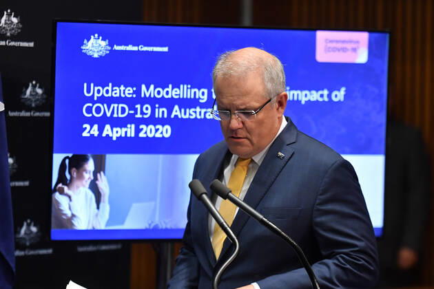SCOTT MORRISON CORONAVIRUS UPDATE, Prime Minister Scott Morrison arrives to give a coronavirus update at a press conference at Parliament House in Canberra, Friday, April 24, 2020. ( NO ARCHIVING, EDITORIAL USE ONLY, NO USE IN BOOKS WITHOUT CONSENT Canberra ACT AUSTRALIA  Copyright: xMICKxTSIKASx 20200424001465039109