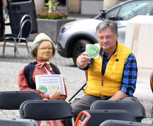 GER Sachsen Dresden Altmarkt for the second time there was a long table of Dresdens innkeepers and restaurateurs where they put out a lot of chairs because many of them are facing ruin because of the corona crisis and too little support is given here Holger Zastrow owner of an event agency and owner of an excursion restaurant and FDP city council 240420 ddbd