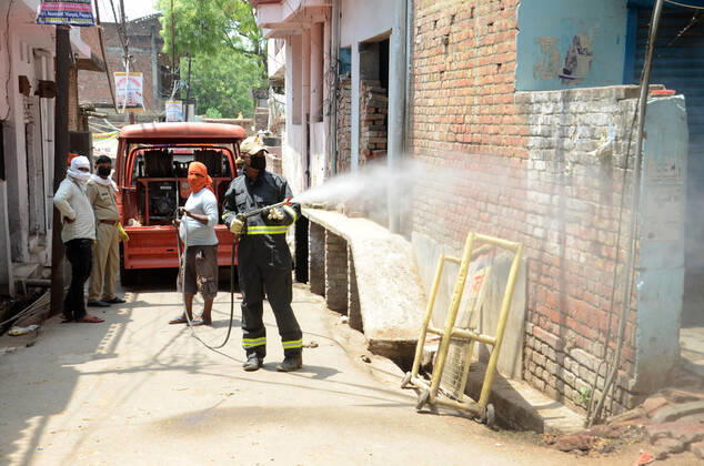 April 25, 2020, Prayagraj, Uttar Pradesh, India: Prayagraj: Police sanitise hotspot area Telierganj during a government-imposed nationwide lockdown as a preventive measure against the COVID-19 coronavirus, in Allahabad on April 24, 2020. Prayagraj India - ZUMAv115 20200425_zap_v115_002 Copyright: xPrabhatxKumarxVermax