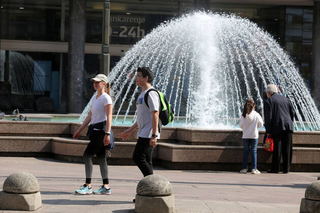 As traders prepare window displays to open, citizens stroll through Korzo 25.04.2020., Croatia, Rijeka - Numerous citizens walked through Korzo. Shops are setting up shop windows ahead of opening next week. GoranxKovacic PIXSELL