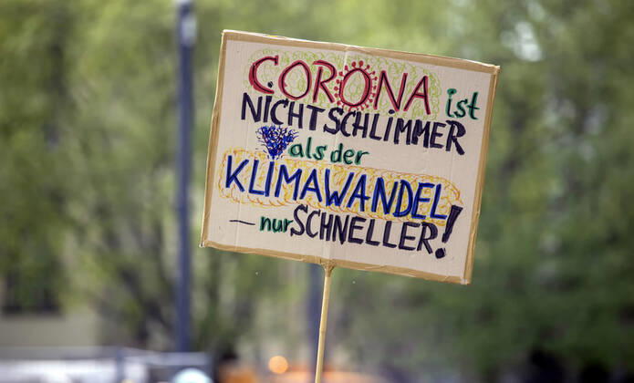 DEU, Germany, Baden Württemberg, Stuttgart, 24 04 2020 Impact of the Corona Crisis Fridays for Future, the protest of youth against climate policy, took their protests with tentative actions back on protest sign Corona is not worse than climate change only faster