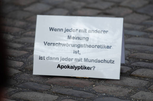 Lockdown end immediately Demonstration on Südermarkt in Flensburg The Communication Center Democratic Resistance organizes a demonstration on 25 04 2020 in Flensburg on Südermarkt, city center here banner with the words If everyone with a different opinion is a conspiracy theorist, then everyone with a face mask is an apocalyptic