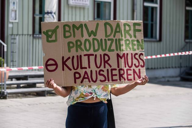 April 25, 2020, Munich, Bavaria, Germany: Contrasting with numerous, controversial Querfront demonstrations in the city center, pro-democracy and left-wing groups demonstrated at the Munich-Giesing train station under the national motto of Ã¢â‚¬oeKeine Quarantaene fuer FreiheitsrechteÃ¢â‚¬Â (No Quarantine for Freedom and Rights). The wave of demonstrations on all fronts are part of a relaxing of the restrictions and in response to a court case that judged the right for demonstrations to be maintained. The group displayed a critical tone against corporations being given favorable treatment during the crisis instead of ordinary people and workers. The group also maintained an explicit pro-science message, with regard to the Coronavirus crisis. Munich Germany - ZUMAb160 20200425_zbp_b160_071 Copyright: xSachellexBabbarx