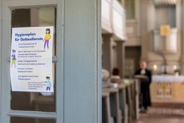 Corona Pandemic Information with hygiene rules for church services at the church of Hermsdorf where on 26 04 2020 a service took place again The Free State of Saxony allows since 20 04 2020 services with up to 15 visitors Hermsdorf Saxony Germany