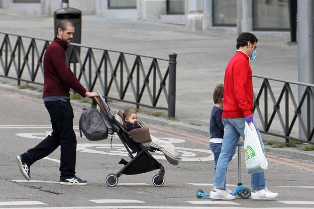 Some families in the streets of Madrid during the first day of permission so that the children can spend an hour daily on the street during the health crisis due to the Covid-19 virus pandemic - Coronaviruss. April 26,2020. (20200426119)