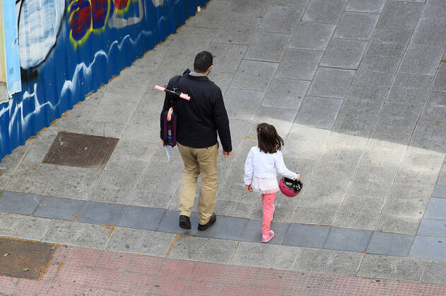 Children begin to go outside on April 26 in Madrid, Spain. (2020042605)