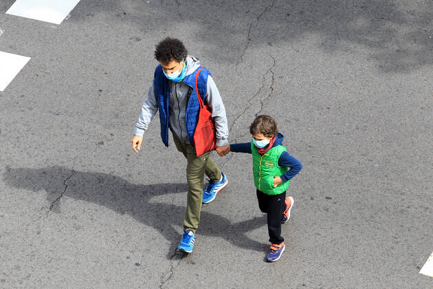 Children begin to go outside on April 26 in Madrid, Spain. (2020042607)