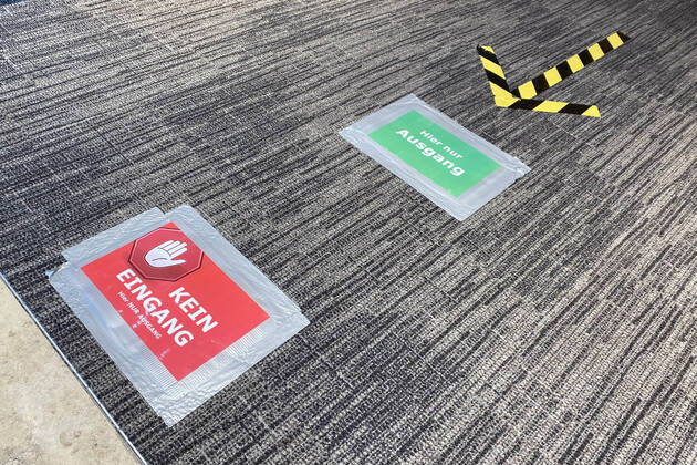 Relaxation and compulsory masks in the coronavirus pandemic Businesses in Bavaria will reopen on April 27th. Markers on the floor will point to the exit of a Hugendubel bookstore One-way street, one-way rule Shop, branch, entrance,