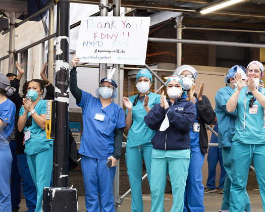 April 27, 2020, New York, NY, U.S: April 27, 2020 - New York, NY, United States: People from Mount Sinai Morningside hospital at the corner of West 113th Street and Amsterdam Avenue clapping and cheering at 7:00pm for frontline and essential workers facing the Coronavirus. New York U.S. - ZUMAb161 20200427_zap_b161_006 Copyright: xMichaelxBrochsteinx
