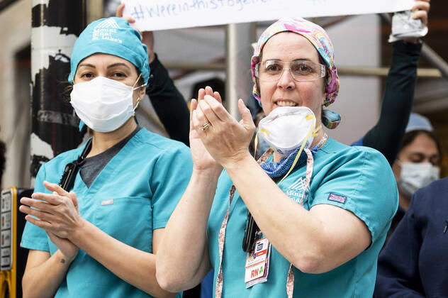April 27, 2020, New York, NY, U.S: April 27, 2020 - New York, NY, United States: People from Mount Sinai Morningside hospital at the corner of West 113th Street and Amsterdam Avenue clapping and cheering at 7:00pm for frontline and essential workers facing the Coronavirus. New York U.S. - ZUMAb161 20200427_zap_b161_013 Copyright: xMichaelxBrochsteinx