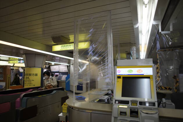 TOKYO, JAPAN - APRIL 28: A plastic sheet curtain is placed between a JR staff and commuters to protect from coronavirus is seen in Tokyo on Tuesday, April 28, 2020. Japanese Prime Minister Shinzo Abe declared a nationwide State of Emergency last week urging people to stay home to prevent the spread of the coronavirus throughout the country. (Photo: Richard Atrero de Guzman AFLO)  (125786460)