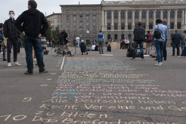 In Leipzig the constitution was painted with chalk on the floor in front of the Leipzig City Library while at a demonstration an open microphone was used for a corona debate for all there was Wilhelm Leuschner Platz Centre Saxony Germany