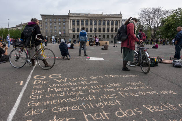 In Leipzig the constitution was painted with chalk on the floor in front of the Leipzig City Library while at a demonstration an open microphone was used for a corona debate for all there was Wilhelm Leuschner Platz Centre Saxony Germany