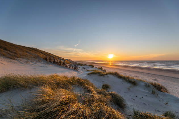 Norderney 15 APR 2020 Sunset in the dunes on the north beach of Norderney EAST FRIESLAND East Frisian Islands Copyright: JanisMEYER Priller&MAUG JMY00G306X