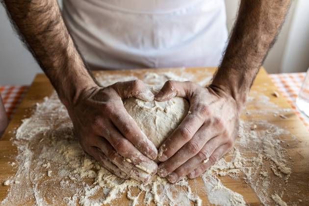 Mans hands shaping heart on dough ball model released Symbolfoto  WPEF02885