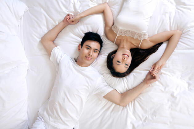 A couple enjoying life in a hotel room  55295075424538740