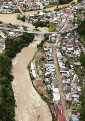 Torrential rain in central Japan Photo taken from a Kyodo News helicopter on July 8, 2020, shows a flooded area in Gero in Gifu Prefecture, central Japan, following torrential rain.