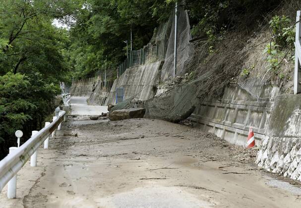 Torrential rain in central Japan Photo taken July 8, 2020, shows a road that has been closed off in Ikusaka in Nagano Prefecture, central Japan, after torrential rain caused a mudslide.