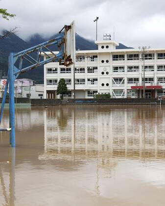 Torrential rain in central Japan Photo taken on July 8, 2020, shows an inundated school ground in Gero in Gifu Prefecture after torrential rain lashed central Japan.