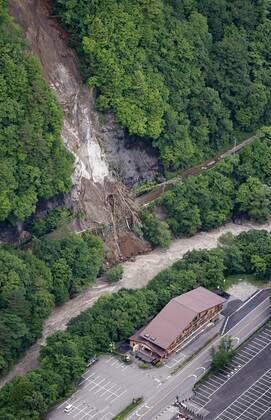Torrential rain in central Japan Photo taken from a Kyodo News helicopter on July 8, 2020, shows the site of a mudslide in Matsumoto, Nagano Prefecture, central Japan, after torrential rain.