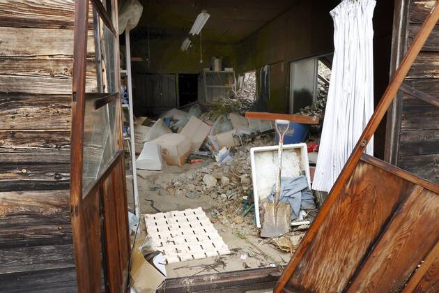 Torrential rain in central Japan Photo taken July 9, 2020, shows a house damaged by a mudslide following torrential rain in Gero in Gifu Prefecture, central Japan.
